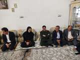 هفته دولت؛ دیدار مسئولان شهرستان هامون با خانواده شهید آصف براهویی